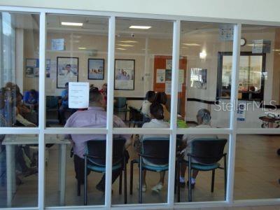 A waiting room with chairs and people seen through a large glass window partition — 3 PR-3 KM 19.9, BARRIO DOS CUERDAS, CANOVANAS, PR