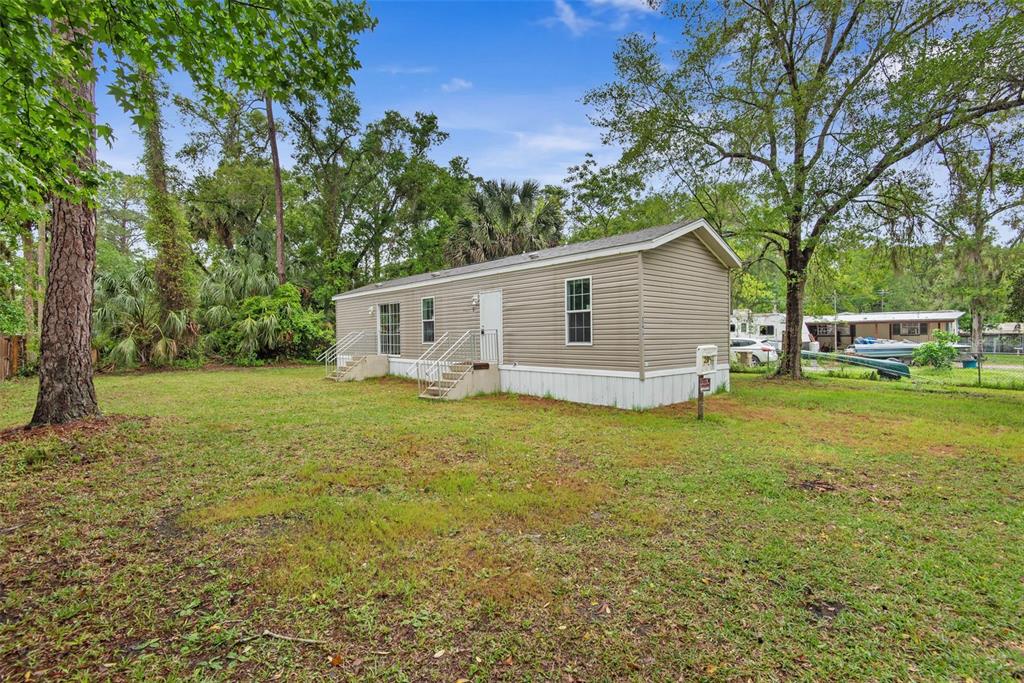 55917 CABBAGE ROAD, ASTOR, FL — photo 2 of 22