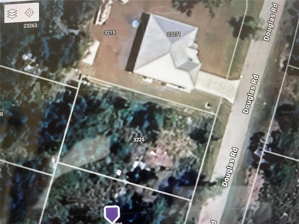 This is an aerial map view showing residential property lots along a road — 3225 DOUGLAS ROAD, PORT CHARLOTTE, FL