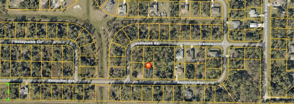 This is an aerial map view of a residential lot highlighted with a red pin — Lot 16 RENTSCHER AVENUE, NORTH PORT, FL