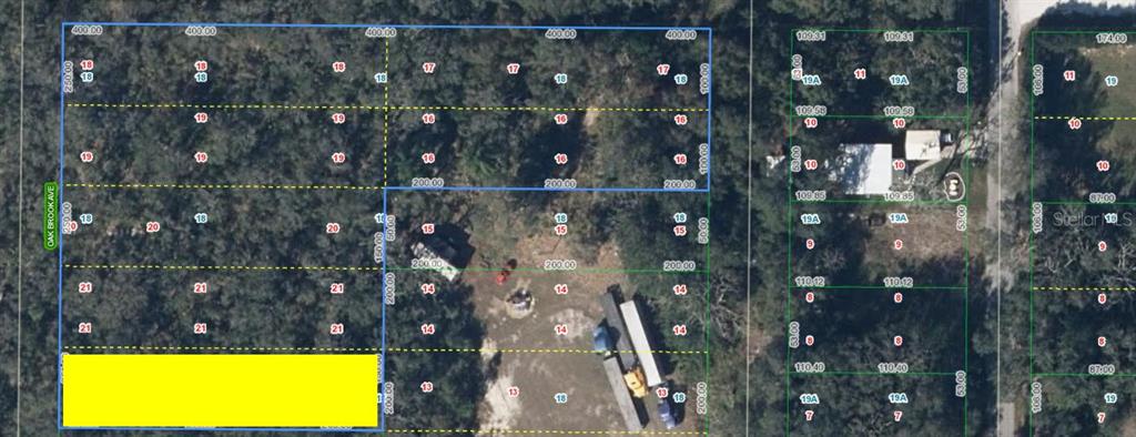 This is an aerial map showing multiple rectangular land parcels with lot numbers and dimensions — 6101 OAK RIDGE AVENUE LOT 22, SEBRING, FL