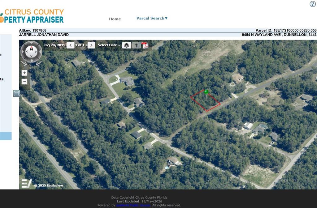 An aerial map view shows a wooded, undeveloped lot outlined in red — 9454 N WAYLAND AVENUE, CITRUS SPRINGS, FL