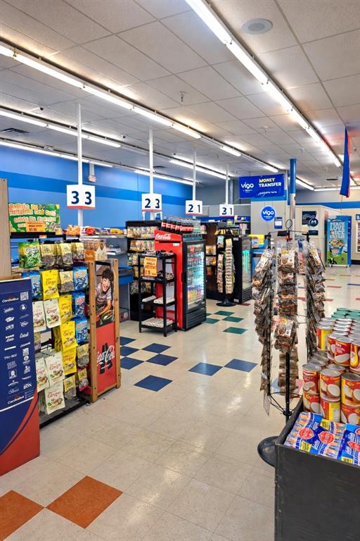 A retail store interior features checkout lanes, product displays, and a tiled floor — 4626 S ORANGE BLOSSOM TRAIL, ORLANDO, FL