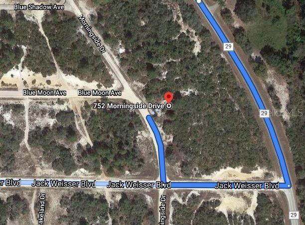 This is a satellite map view showing a vacant lot near a road intersection — 752 MORNINGSIDE DRIVE, LAKE PLACID, FL