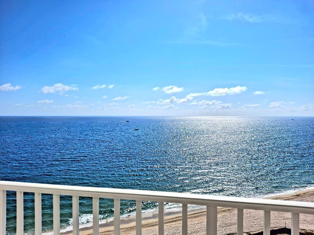 A view of the ocean and beach from a white balcony railing — 1340 S Ocean Boulevard # 1808, Pompano Beach FL 33062, POMPANO BEACH, FL