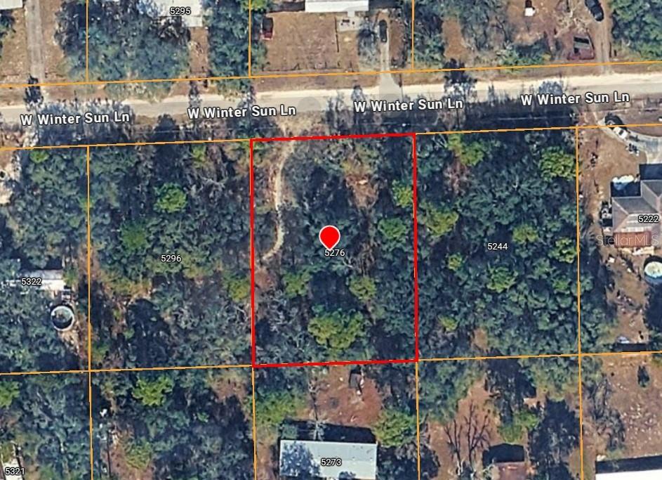 This is an aerial map view of a rectangular, wooded vacant lot — 5276 W WINTER SUN LANE, HOMOSASSA, FL