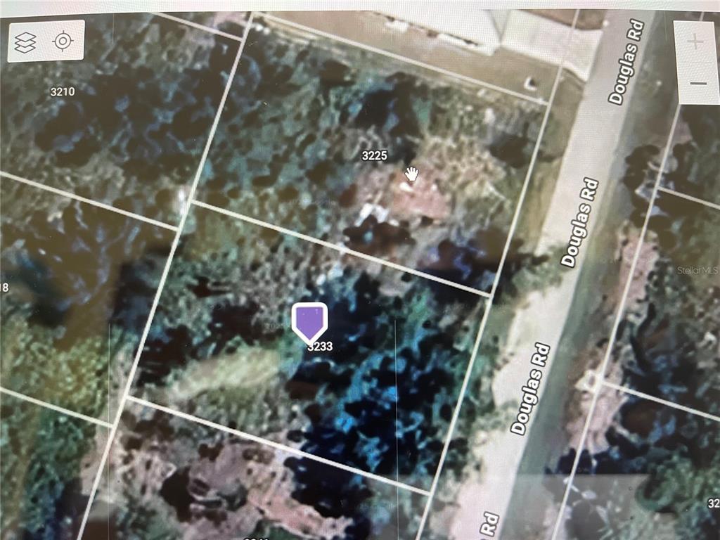 This is a satellite map view showing property lot lines and street names — 3233 DOUGLAS ROAD, PORT CHARLOTTE, FL
