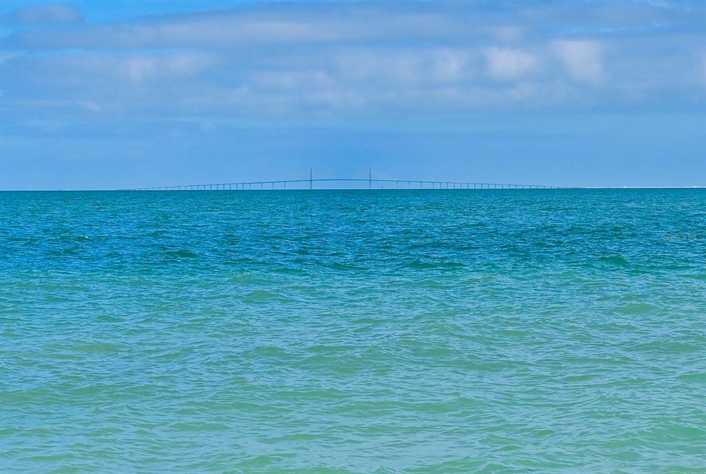 A view of the Sunshine Skyway Bridge spanning across the horizon over the ocean — 837 N SHORE DRIVE, ANNA MARIA, FL