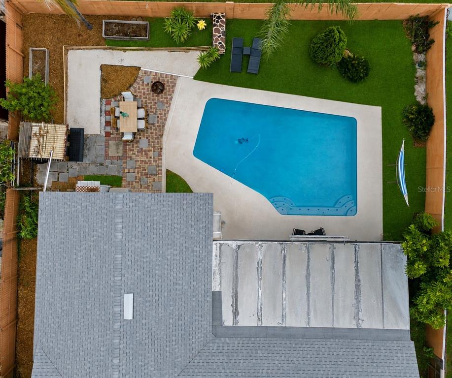 An aerial view of a backyard featuring a swimming pool, patio, and landscaped lawn — 961 APPLE LANE, ALTAMONTE SPRINGS, FL