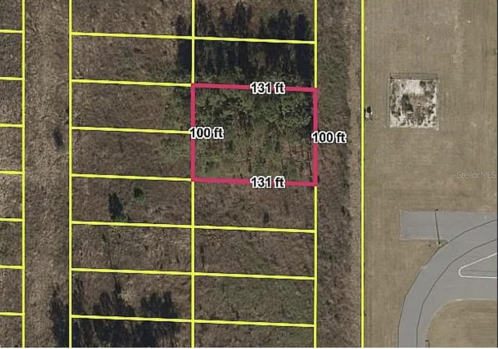 An aerial map shows a rectangular plot of land with dimensions labeled in feet — 0 SW 19TH AVENUE, WILLISTON, FL
