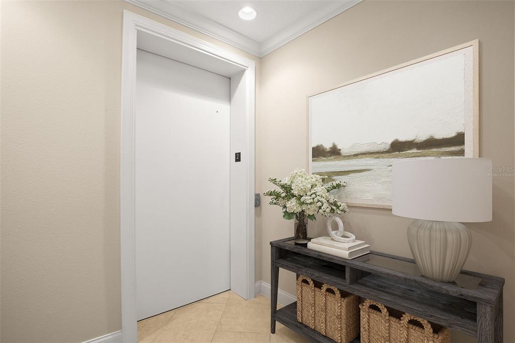 A hallway features a white door, a console table with decor, and a framed landscape painting — 8 ACADEMY WAY S UNIT 123, ST PETERSBURG, FL