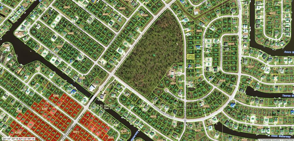 This is a satellite map view of a residential neighborhood with many vacant lots — 8480 MATECUMBE ROAD, PORT CHARLOTTE, FL