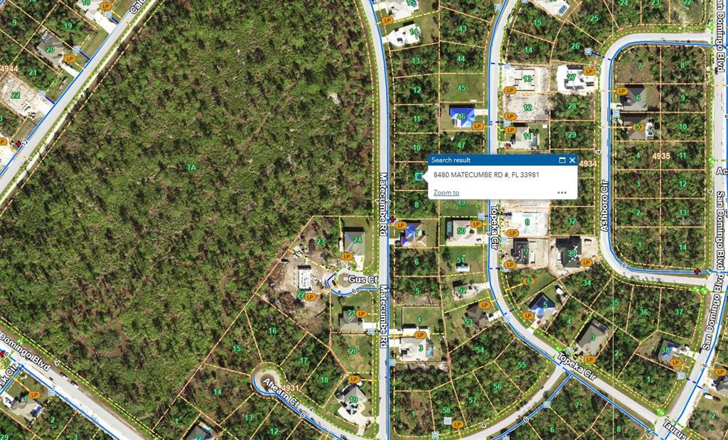This is a satellite map view of a residential neighborhood with several houses and roads — 8480 MATECUMBE ROAD, PORT CHARLOTTE, FL