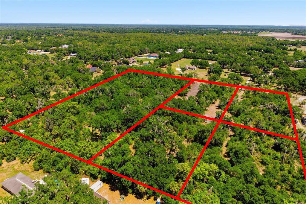 This is a subdivision plat map showing property boundaries, lot dimensions, and easements for HLT Estates — 19084 RED BIRD LANE LOT 3, LITHIA, FL