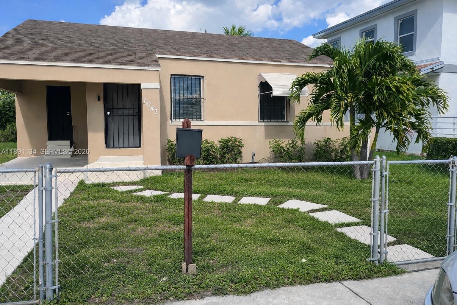 1043 NW 75th St, Miami FL 33150