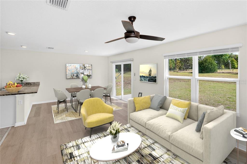 This is a digital rendering of an open-concept living and dining area with neutral finishes — 17499 NW 172ND AVENUE, ALACHUA, FL