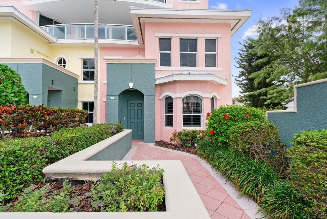 A pink and teal multi-story building with a paved walkway leading to a front entrance — 2051 SE 3rd Street, Deerfield Beach FL 33441, DEERFIELD BEACH, FL