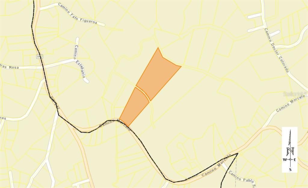 This is a map showing two adjacent land parcels highlighted in orange — CAMINO MORCELO, SAN JUAN, PR