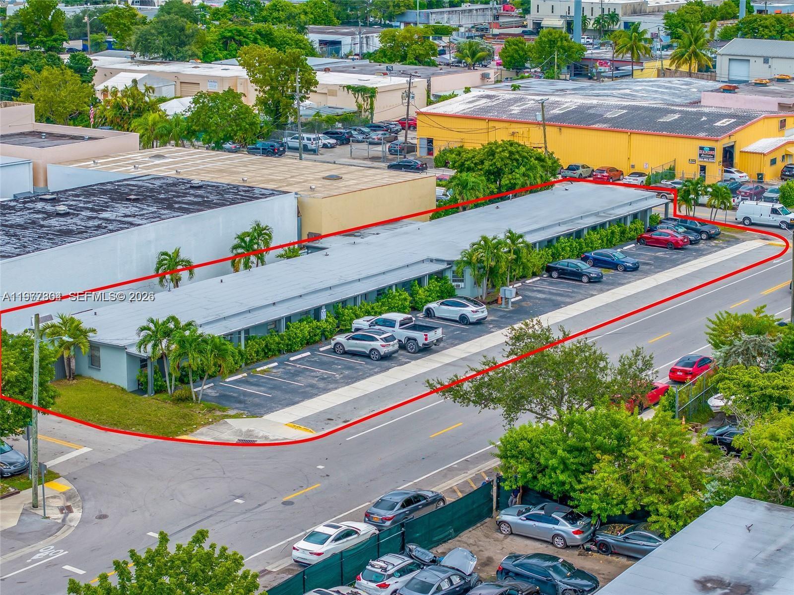 An aerial view shows a single-story commercial building with a parking lot outlined in red — 5807 SW 25th St # 18, West Park FL 33023, WEST PARK, FL
