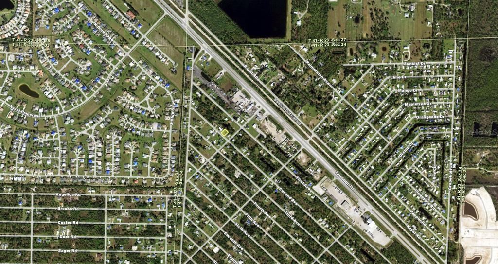 This is an aerial map view of a residential neighborhood with intersecting streets and roads — 11182 2ND AVENUE, PUNTA GORDA, FL