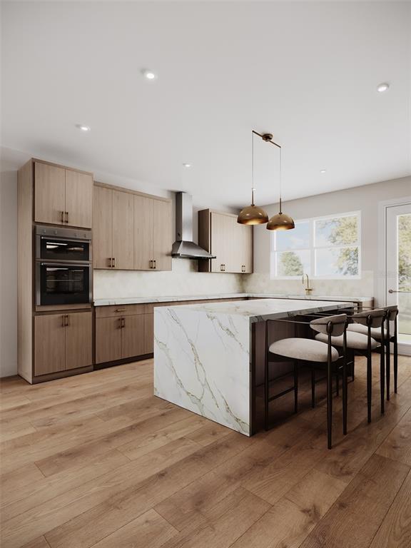 This is a rendering of a modern kitchen featuring wood cabinetry and a marble island — 2168 9TH AVENUE N UNIT 4, ST PETERSBURG, FL