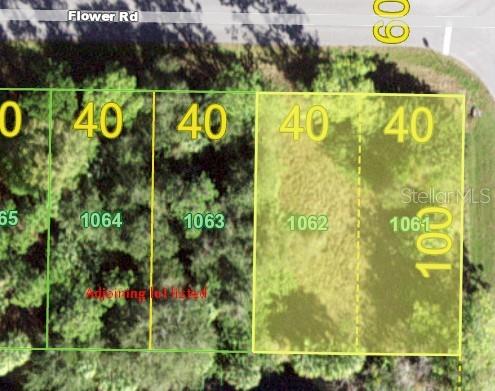 This is a map showing four adjacent rectangular land parcels labeled 1061 through 1064 — 26153 FLOWER ROAD, PUNTA GORDA, FL