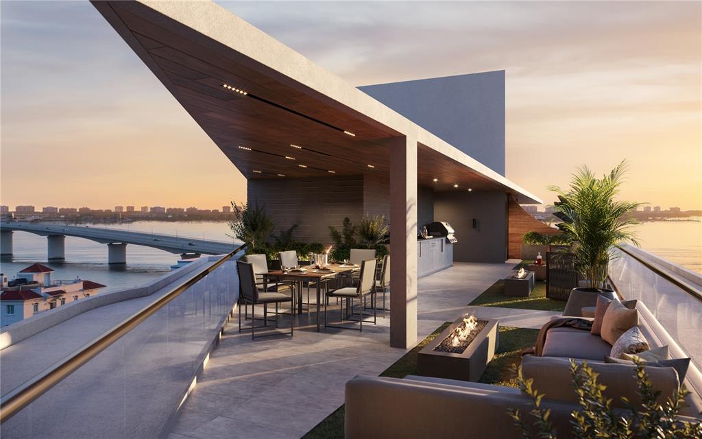 This is a rendering of a modern rooftop terrace featuring a dining area and fire pits — 688 GOLDEN GATE POINT UNIT 801, SARASOTA, FL