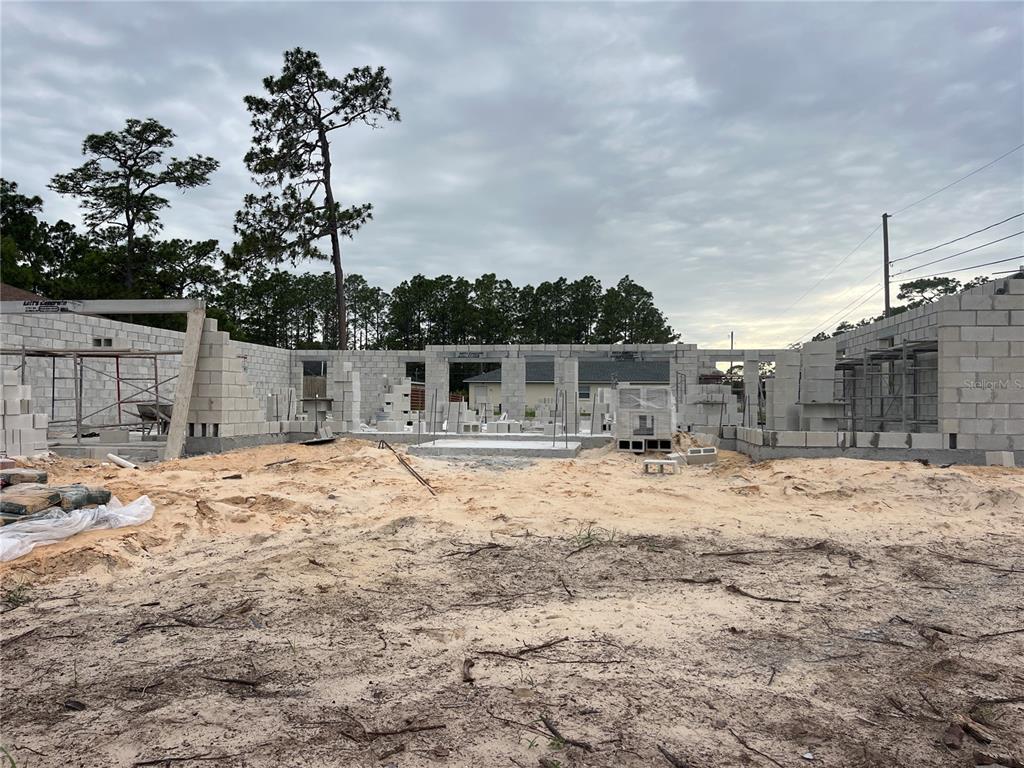 This floor plan shows a four-bedroom, two-bath home with a two-car garage and patio — 52 HEMLOCK TRAIL, OCALA, FL