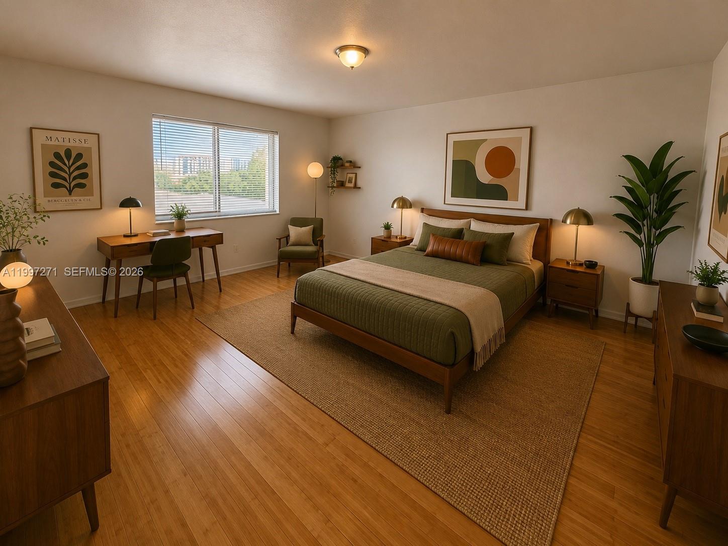 This bedroom features a bed, desk, and mid-century modern furniture on hardwood floors — 36 NW 6th Ave # 504, Miami FL 33128, MIAMI, FL