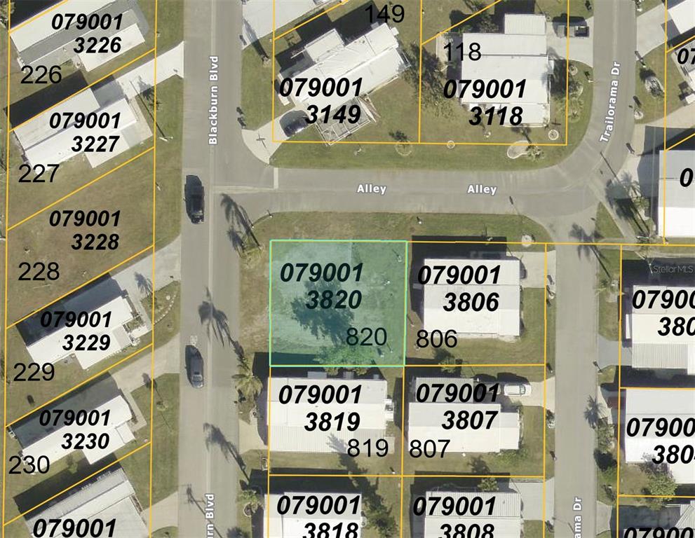 This is an aerial map view showing residential lots and property boundaries — 401 BLACKBURN BOULEVARD, NORTH PORT, FL