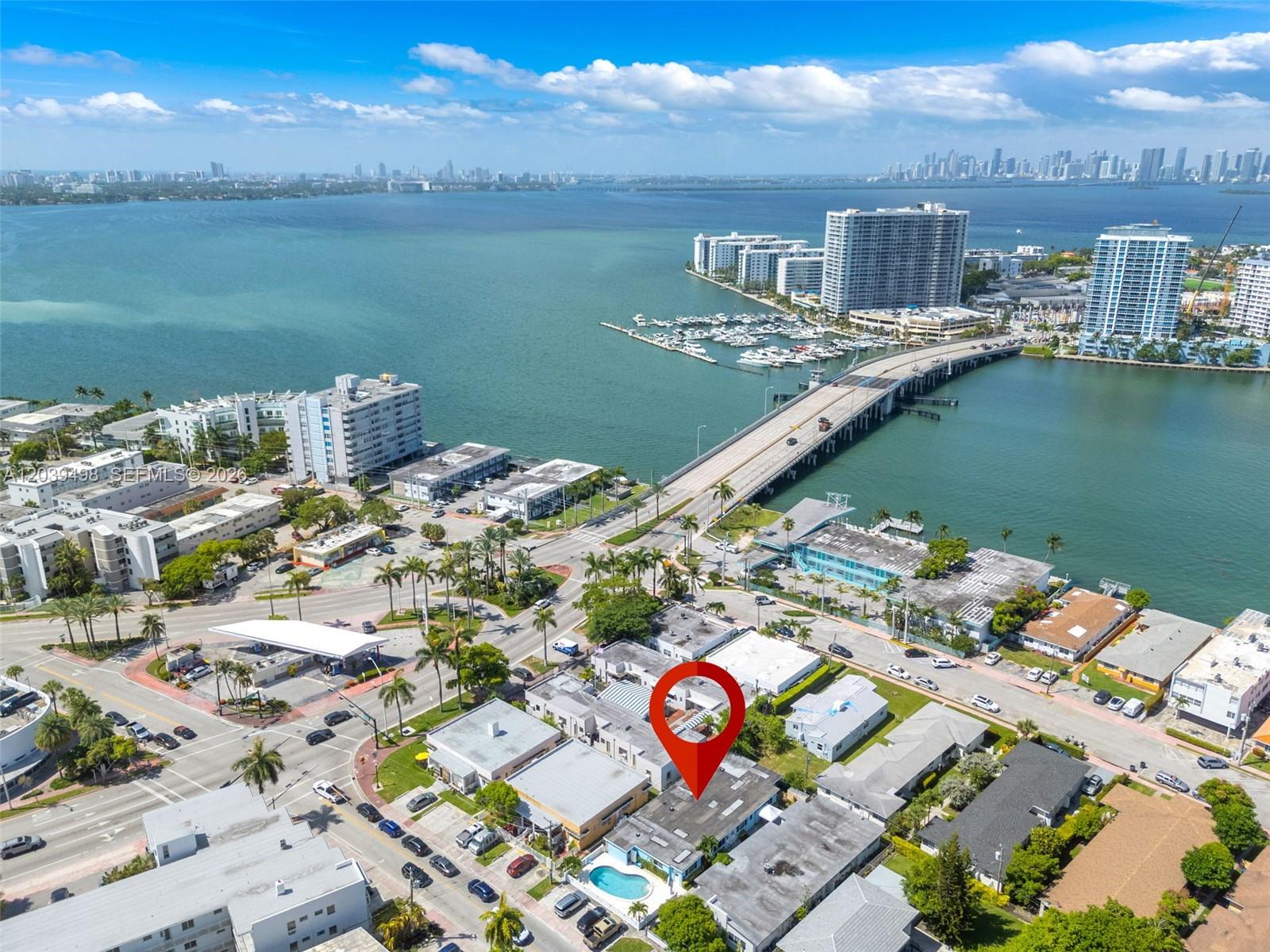 An aerial view shows a residential building with a swimming pool marked by a pin — 2120 Biarritz Dr, Miami Beach FL 33141, MIAMI BEACH, FL