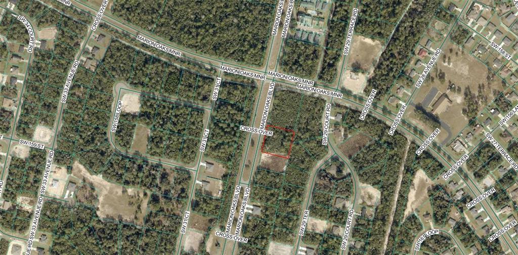 This is an aerial map showing a vacant, rectangular lot outlined in red — MARION OAKS BOULEVARD, OCALA, FL