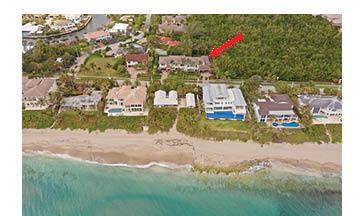 An aerial view shows a coastal residential property with a red arrow pointing toward a house — 4102 S Ocean Boulevard, Highland Beach FL 33487, HIGHLAND BEACH, FL