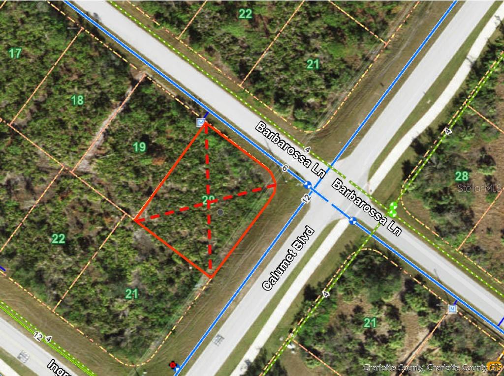 This is a satellite map showing a vacant lot outlined in red at a street intersection — 14259 BARBAROSSA LANE, PORT CHARLOTTE, FL