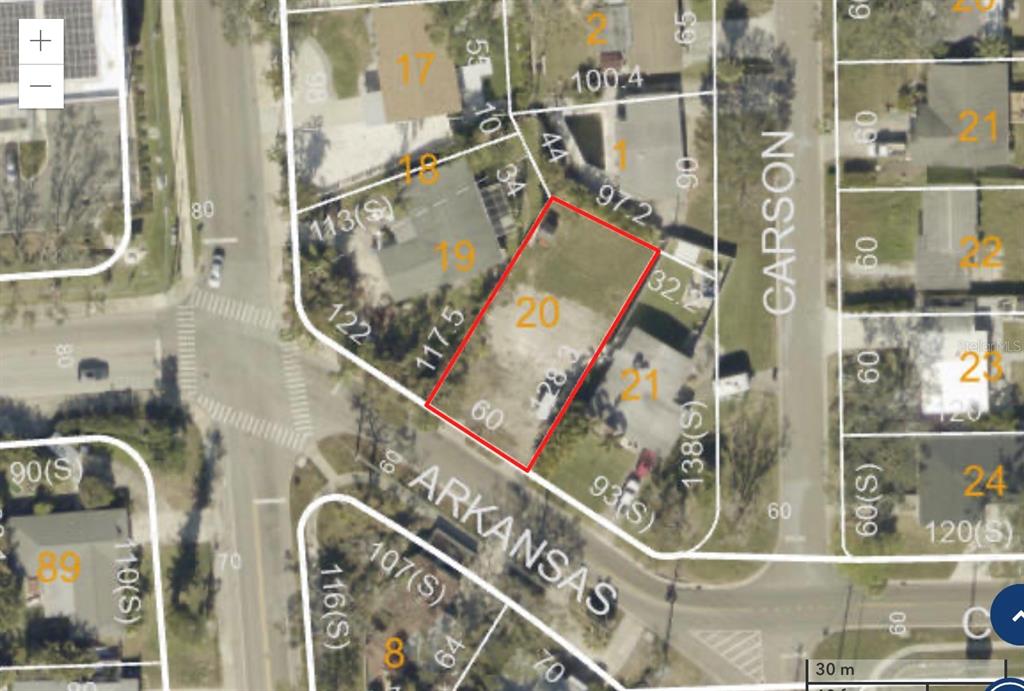 This is a map showing a highlighted rectangular land parcel located at a street intersection — 4111 ARKANSAS AVENUE NE, ST PETERSBURG, FL