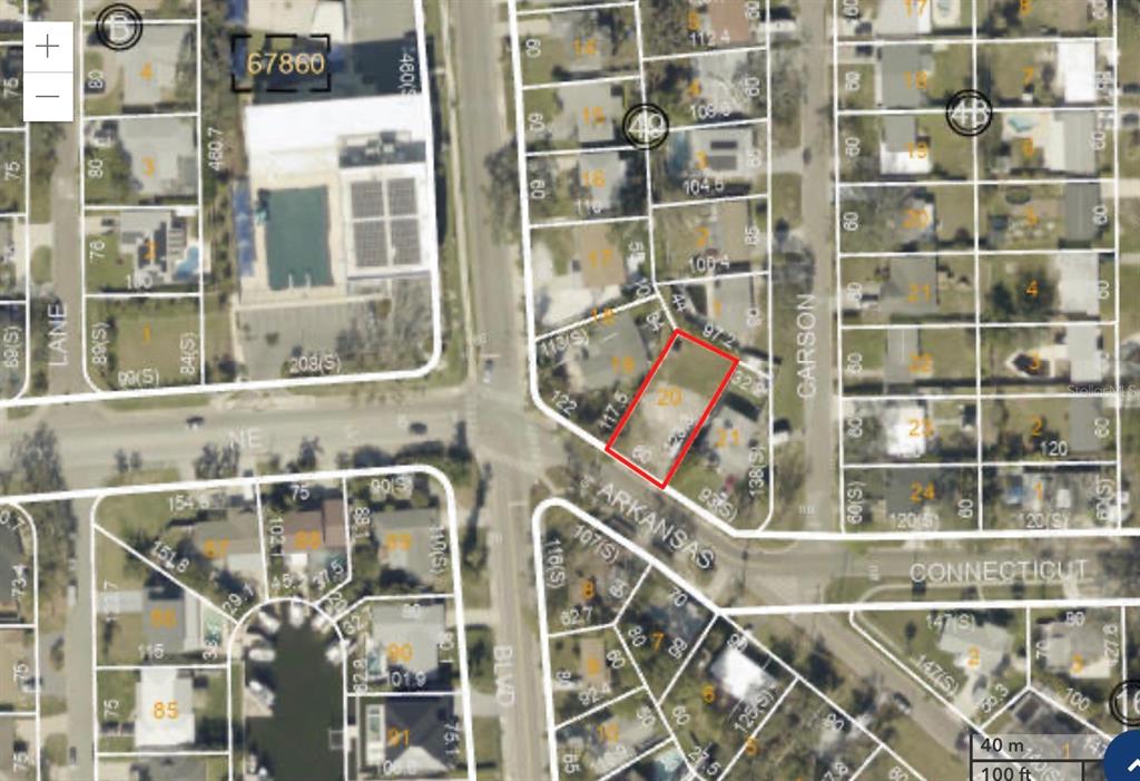 This is a satellite map view showing property lot lines and street layouts — 4111 ARKANSAS AVENUE NE, ST PETERSBURG, FL