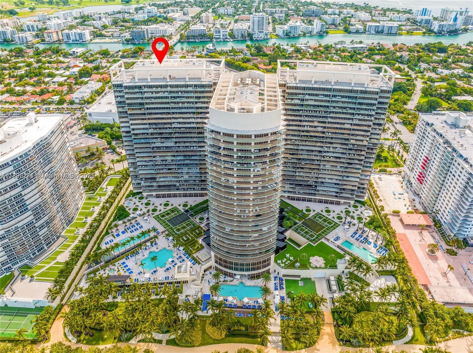 Aerial view of three high-rise residential towers with pools and landscaped grounds — 9701 Collins Ave # 802S, Bal Harbour FL 33154, BAL HARBOUR, FL