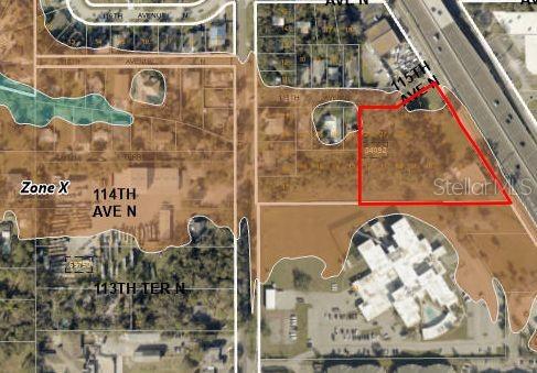 An aerial map shows a vacant parcel of land outlined in red near a highway — 11400 US HIGHWAY 19 N, CLEARWATER, FL