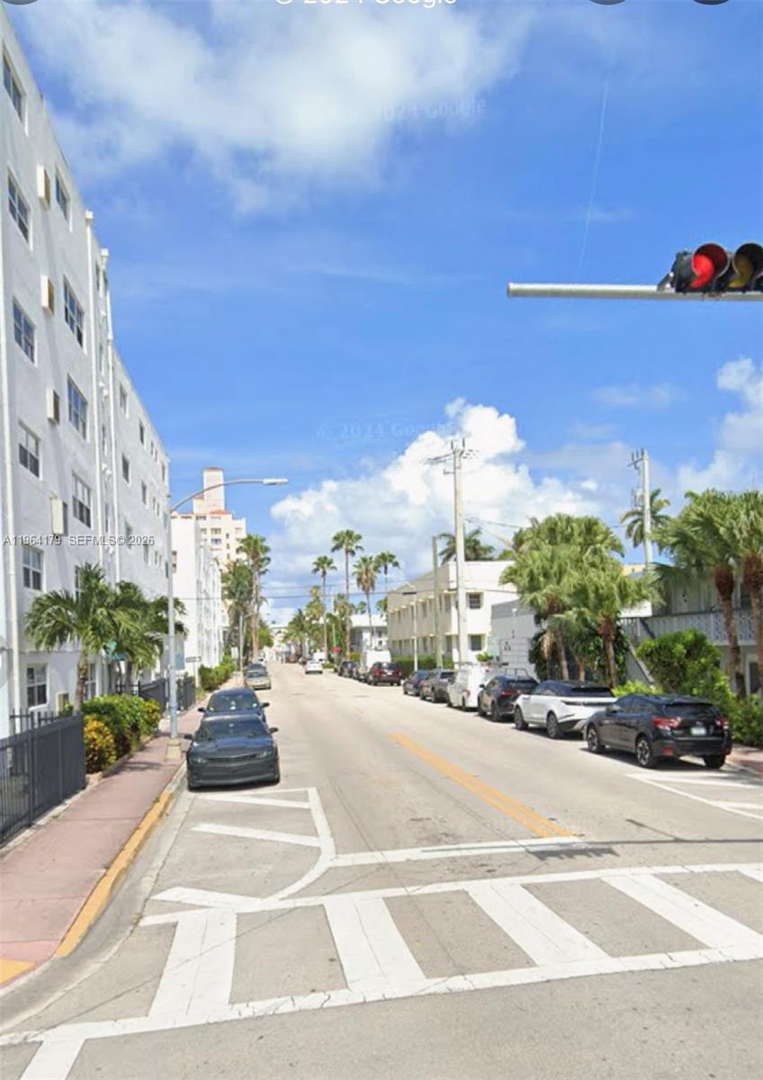 A street view shows a multi-story white building on the left and parked cars — 801 Meridian Ave # 3B, Miami Beach FL 33139, MIAMI BEACH, FL