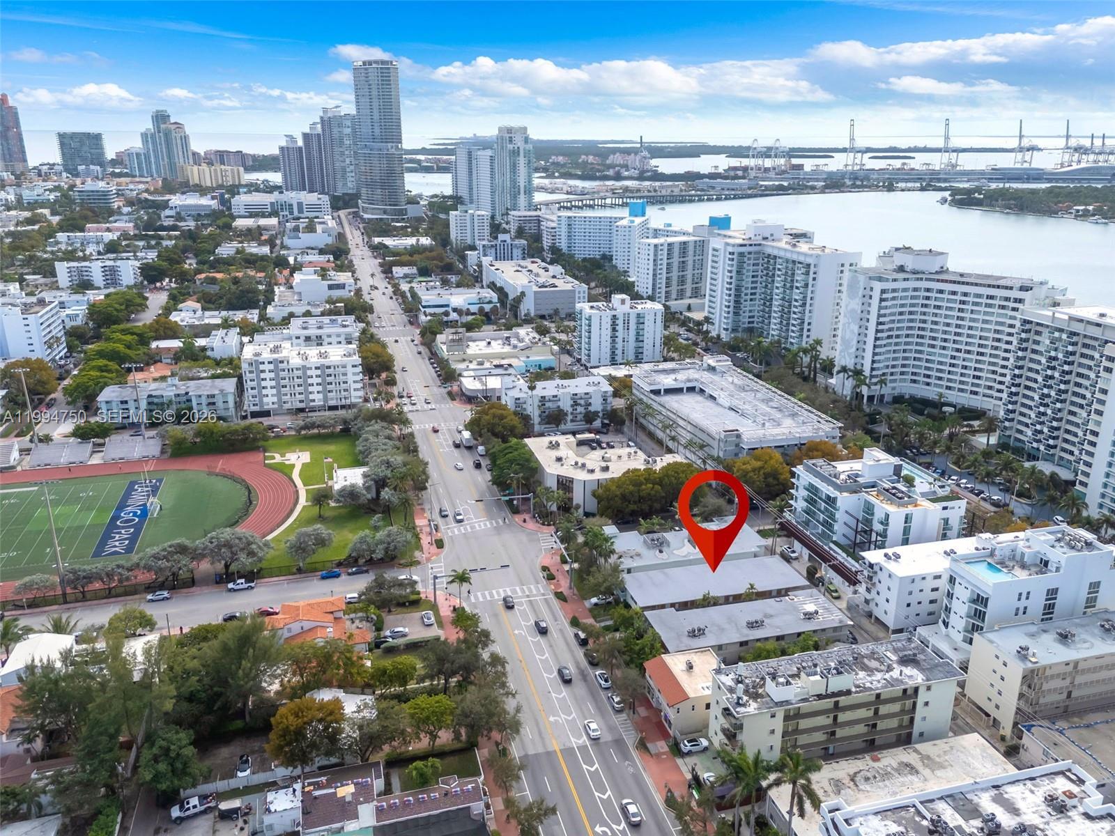 An aerial view shows a city street, a park with a track, and a red location pin — 1214 Alton Rd, Miami Beach FL 33139, MIAMI BEACH, FL