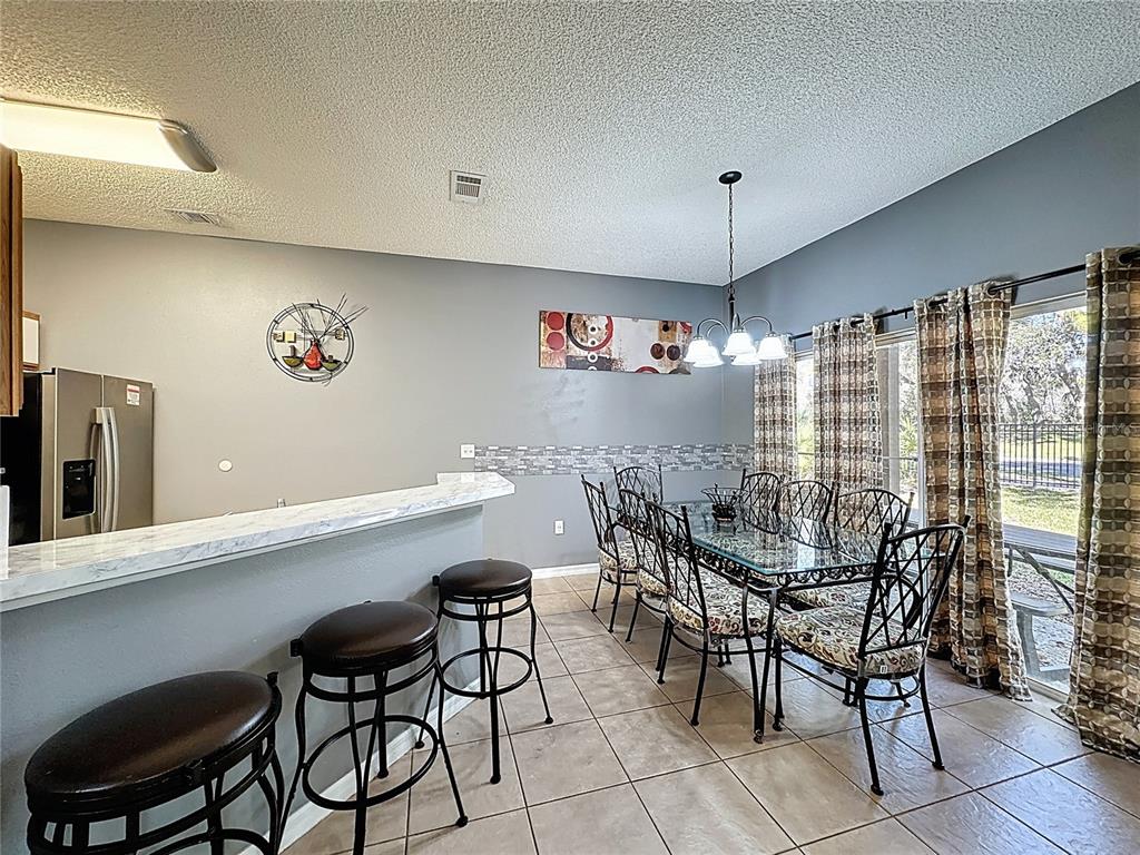 8401 CRYSTAL COVE LOOP, KISSIMMEE, FL — photo 4 of 30
