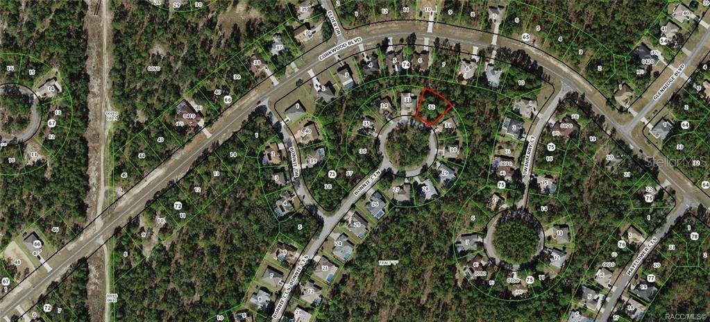 This is an aerial map showing a residential neighborhood with a highlighted vacant lot — 14 BONNIE COURT N, HOMOSASSA, FL