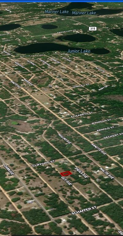 An aerial map view highlights a rectangular property lot located near Guy Avenue — LOT 24 GUY AVENUE, INTERLACHEN, FL