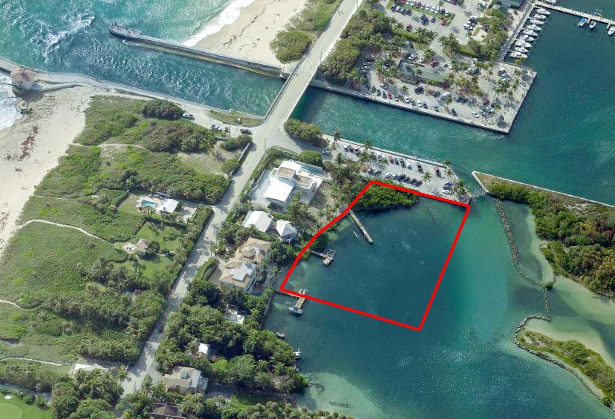 An aerial view shows a waterfront property lot outlined in red near a bridge — 4000 S Ocean Boulevard, Manalapan FL 33462, MANALAPAN, FL