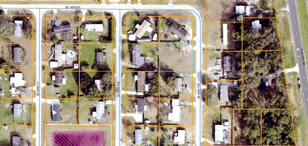 This is an aerial map showing residential lots and streets in a neighborhood — 14052 SE 63RD TERRACE, SUMMERFIELD, FL