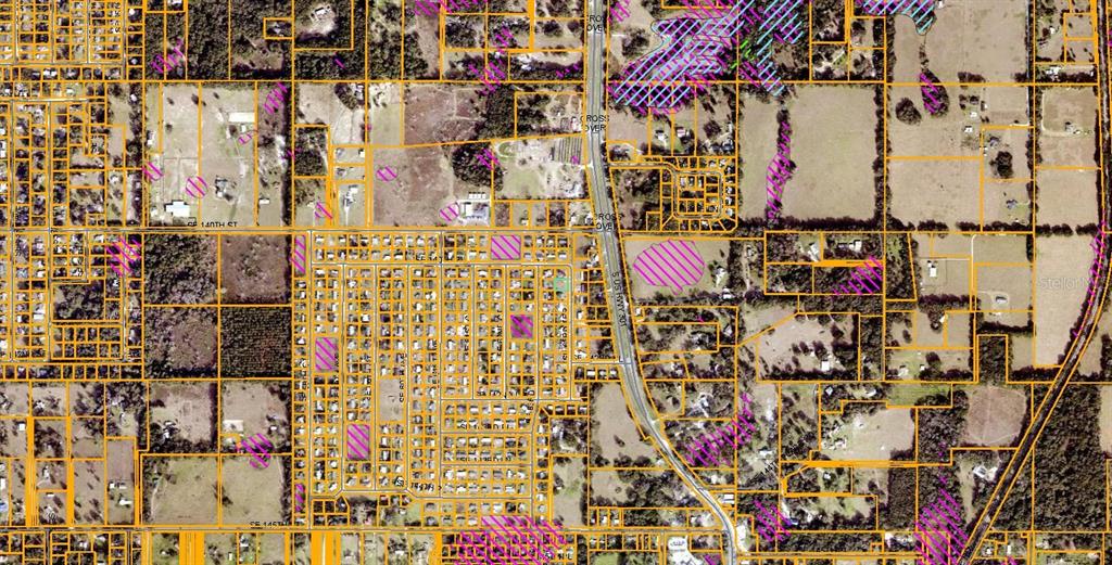 This is an aerial map showing property boundaries and land use overlays for a rural area — 14052 SE 63RD TERRACE, SUMMERFIELD, FL