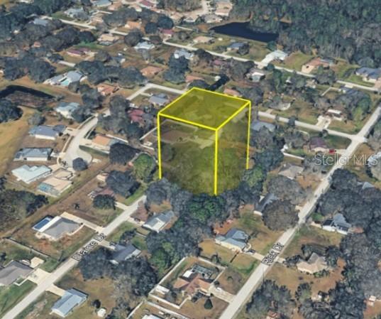 An aerial view shows a residential lot highlighted by a yellow cube outline — 5728 ELAINE DRIVE, ZEPHYRHILLS, FL