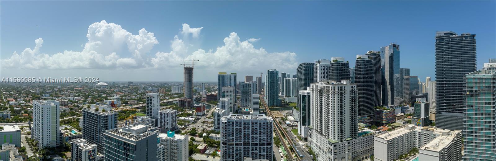 A panoramic view of the Miami skyline featuring numerous high-rise buildings and urban infrastructure — 1133 SW 2nd Ave # 3607, Miami FL 33130, MIAMI, FL