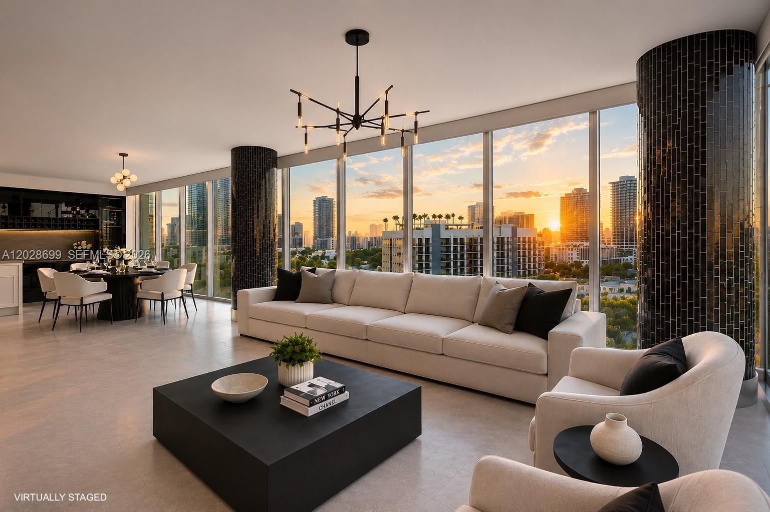 A virtually staged living room features a large sofa, black coffee table, and floor-to-ceiling windows — 601 NE 36th St # 1101, Miami FL 33137, MIAMI, FL