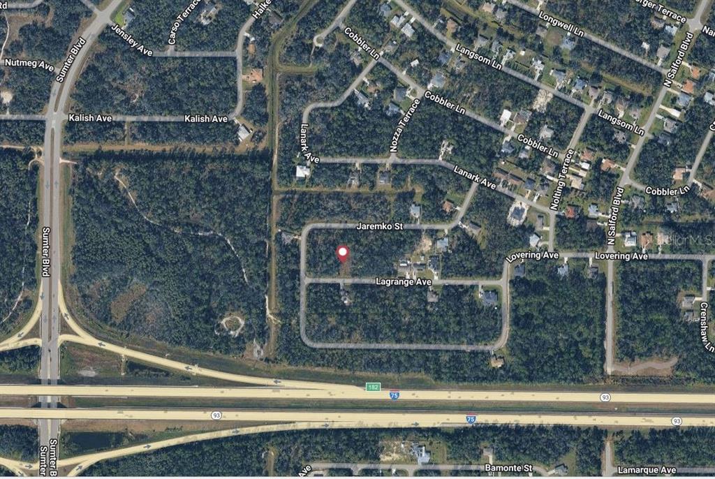 This is an aerial map showing a vacant lot marked with a red dot — 4340 LAGRANGE AVENUE, NORTH PORT, FL